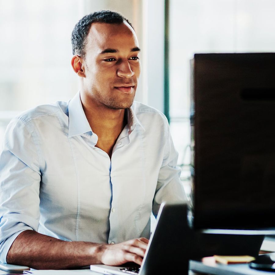 Man Checking His Computer 