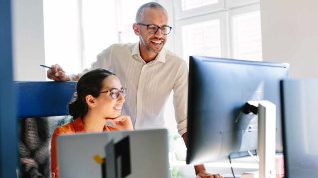 Coworkers Reviewing Work 