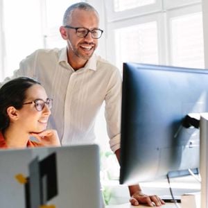 Coworkers Reviewing Work 