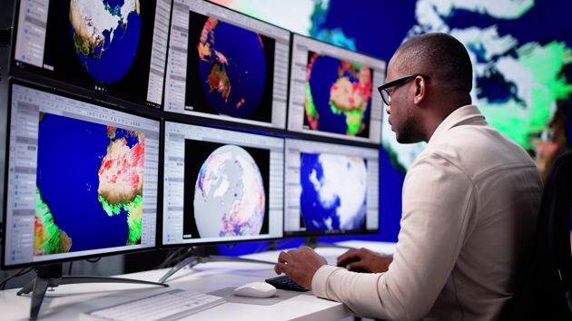 Man Checking Charts 