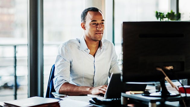Man Using The Laptop 