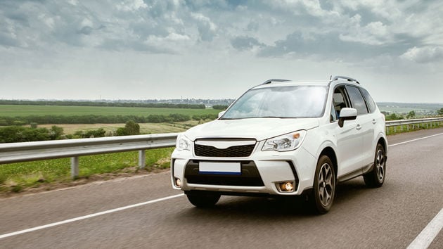 Compact Suv On Rural Road 
