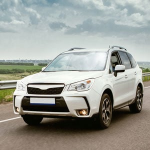 Compact Suv On Rural Road 