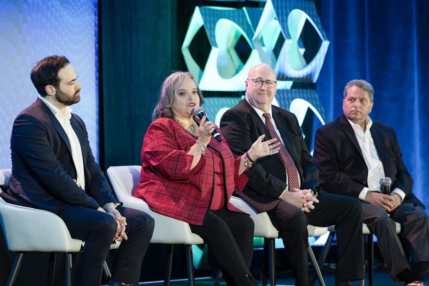 Group Of People On Stage At Conference