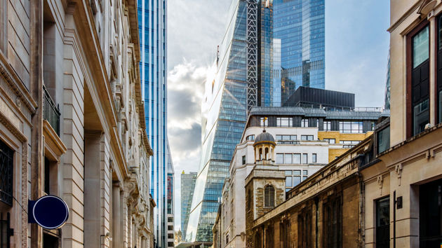 Street In City Of London Financial District With Commercial Buildings 
