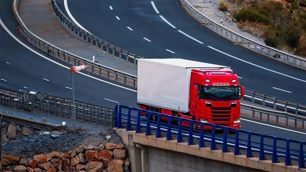 Semi Truck On Curving Highway 