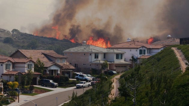 Wildfire And Smoke Behind Neighborhood Homes 