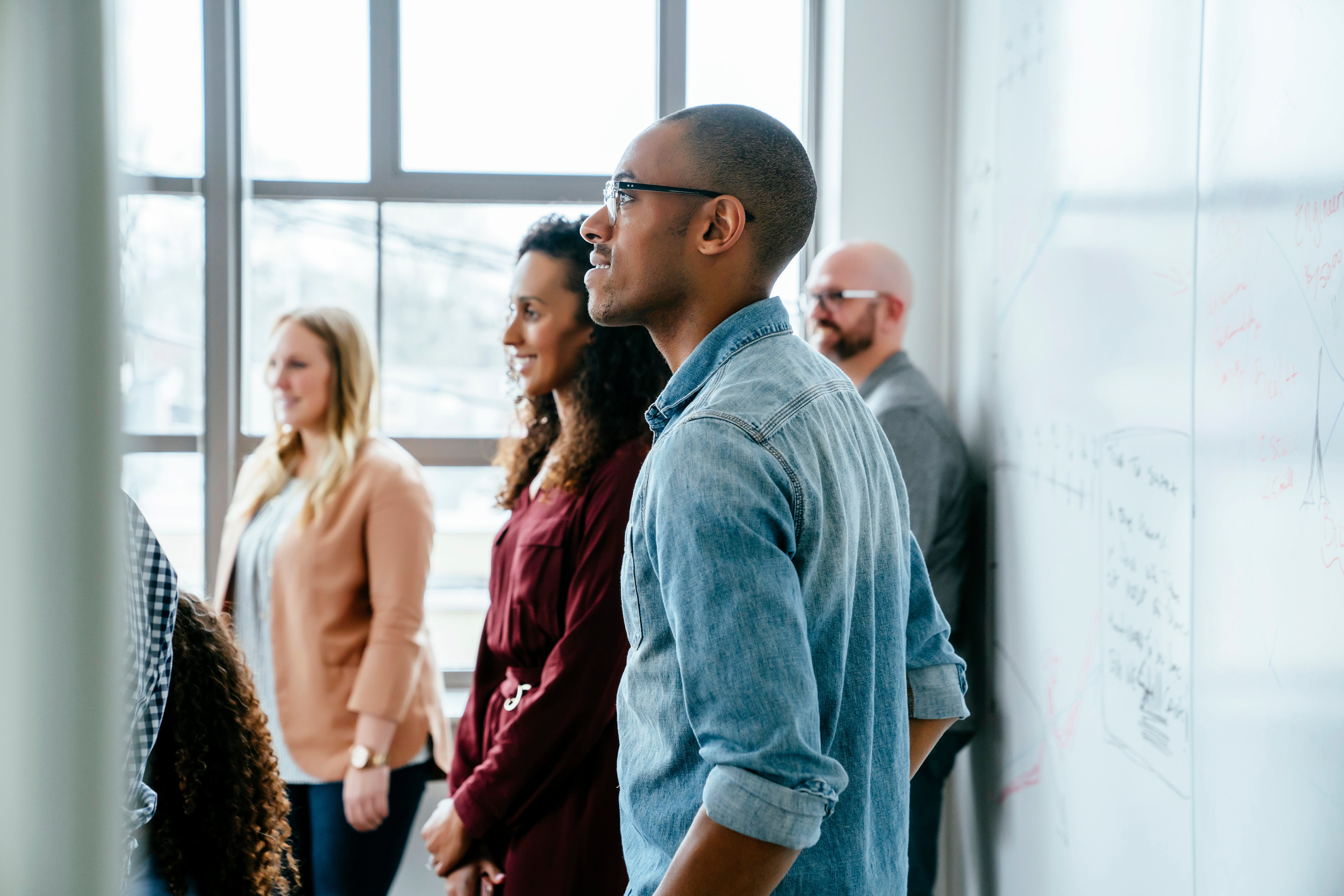CMS S111 NGHP Blog Image with people standing and smiling