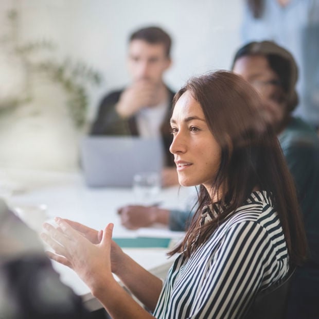 Academy Attendees Around Classroom Table 