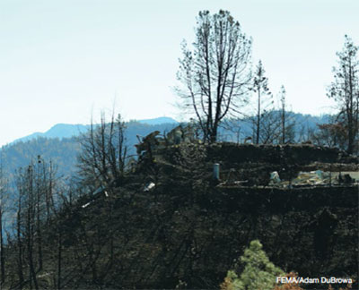 Home located on steep slope by Valley Fire